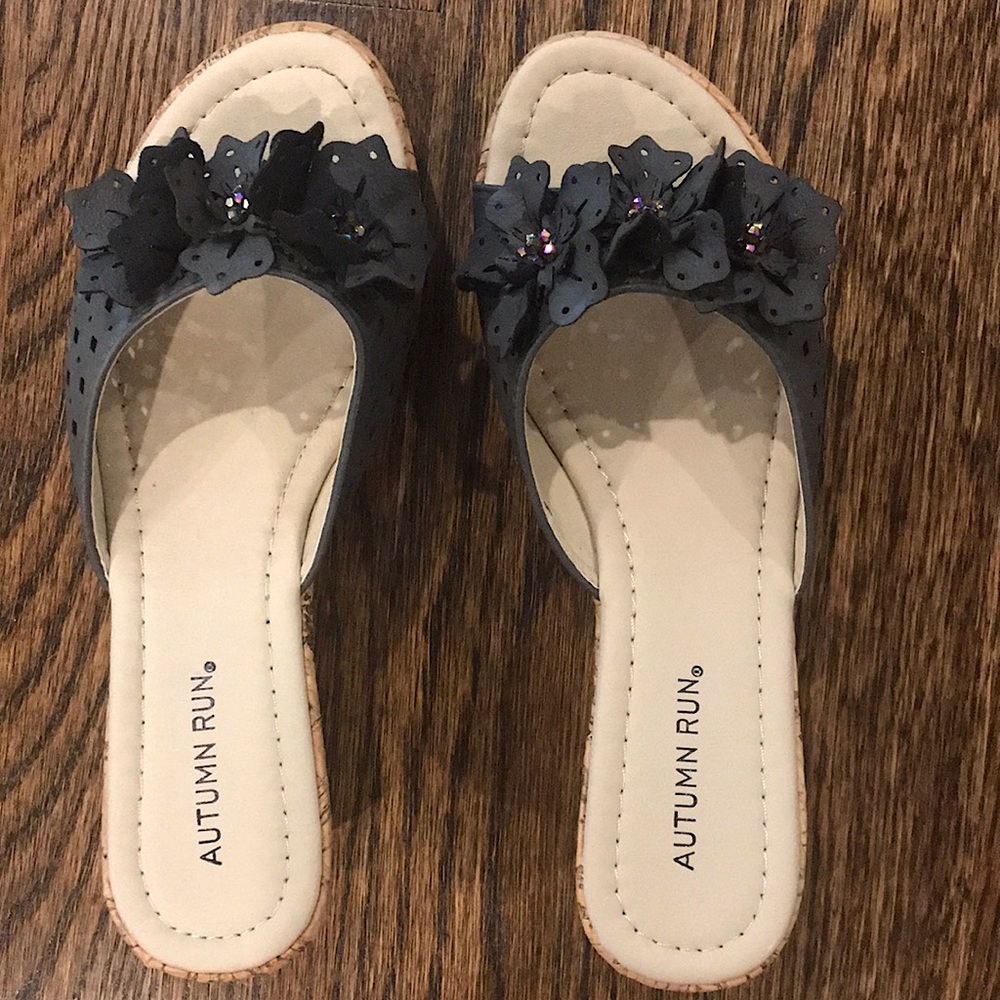 Gray, natural wedge sandals.